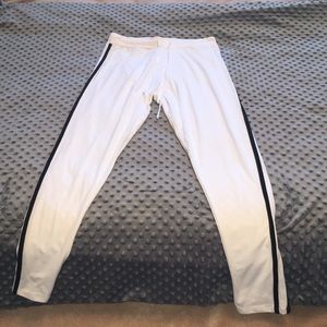 white leggings with black stripe detailing